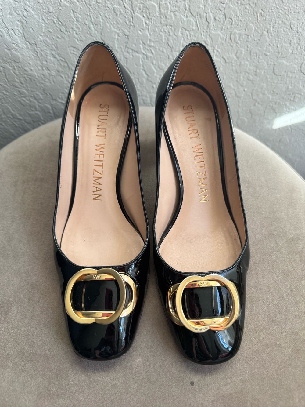 Stuart Weitzman Black Patent Pumps with Gold Buckle Accent